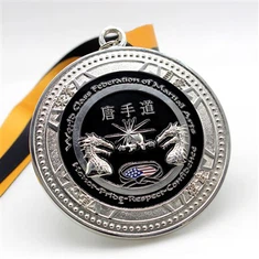 Medalles de plata de Taekwondo en relleu